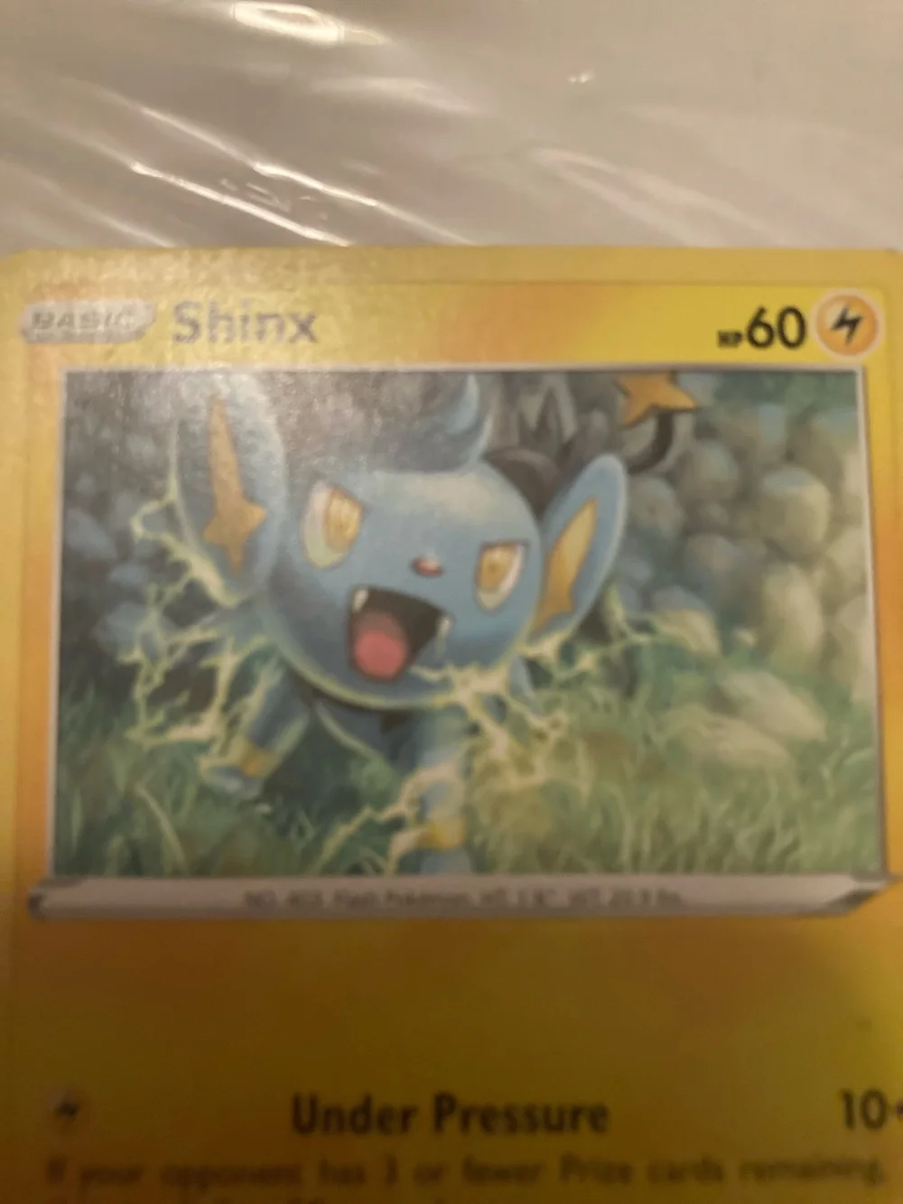 Had a dent on it, see in pictures Pokemon Shinx Yellow Lightning Energy Card